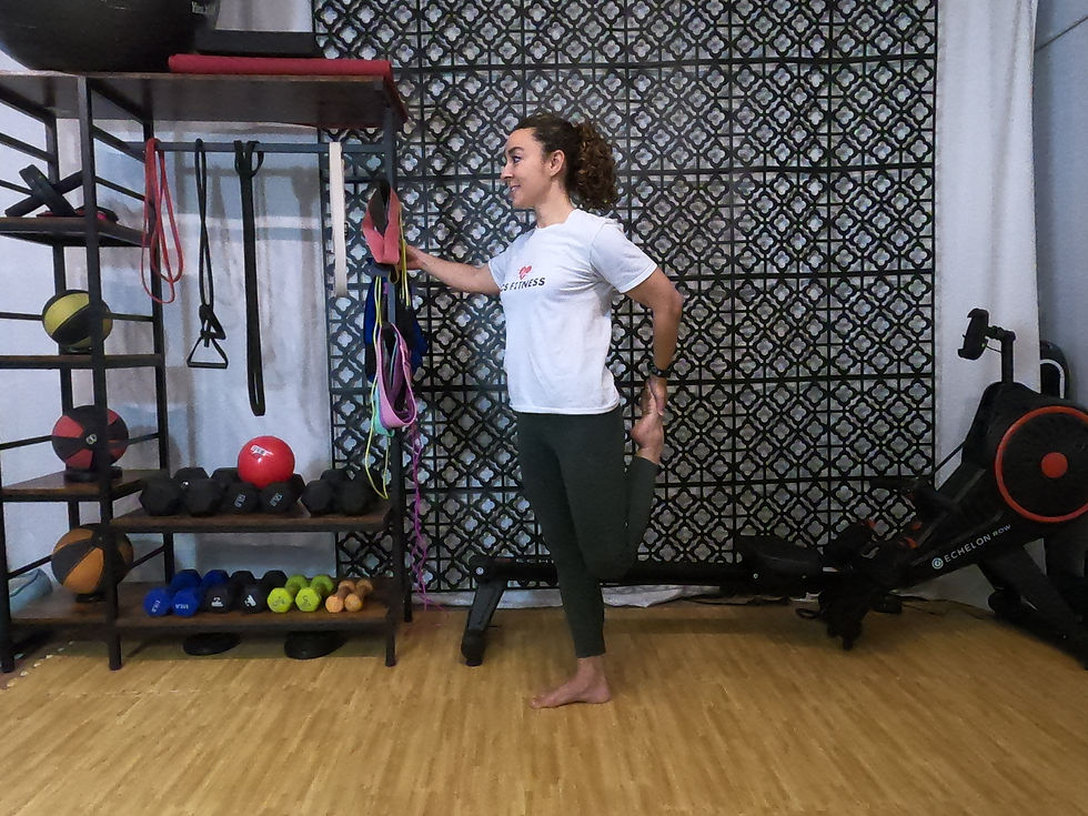 Coach Cassandra in a quad stretch