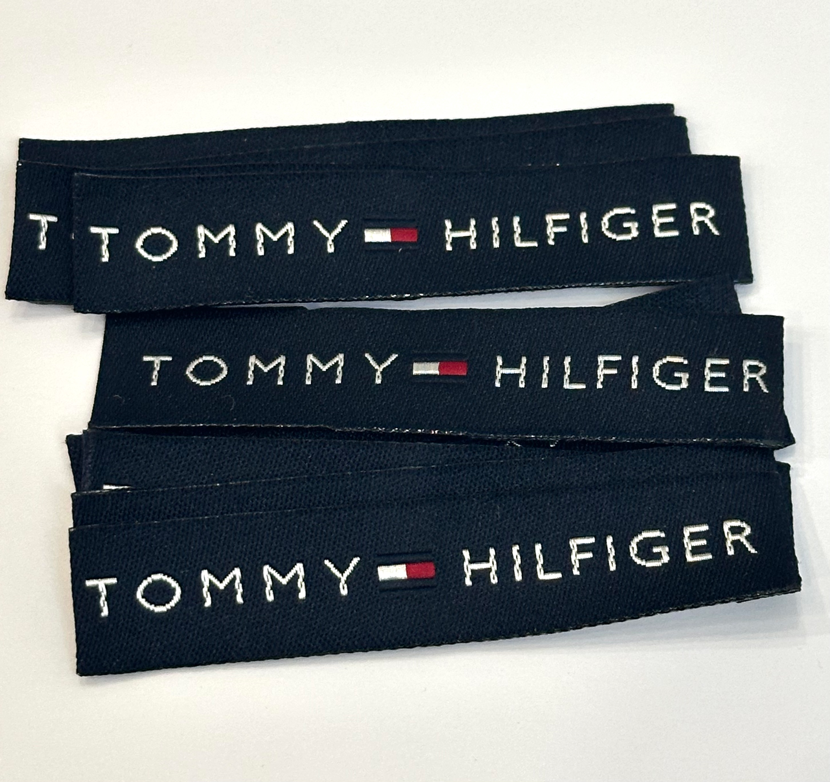 Лейба жакард 6.7*1.5см колір синій логотип Tommy Hilfiger