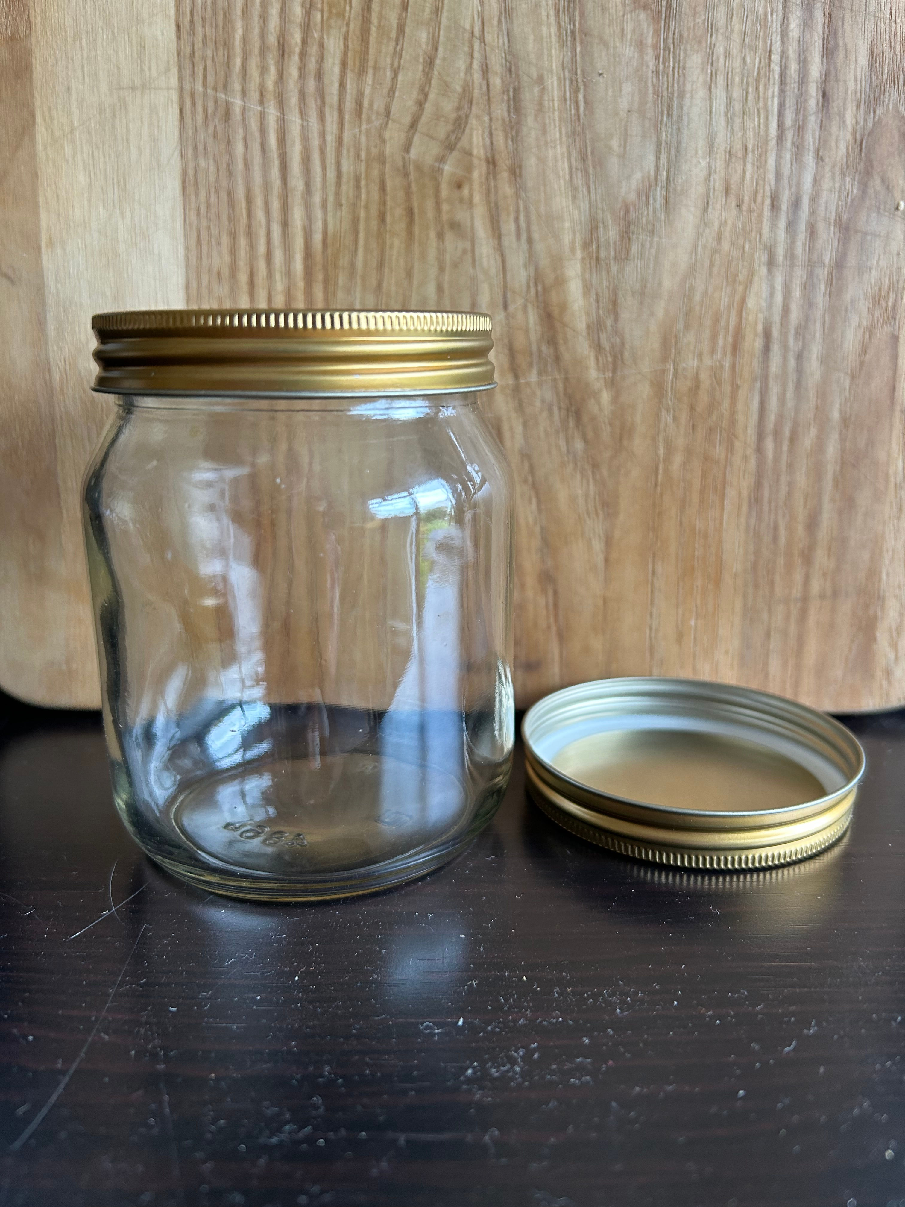 Traditional 1 lb round honey jar with gold metal screw lids