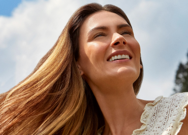 Happy patient showing results of Restylane injections.