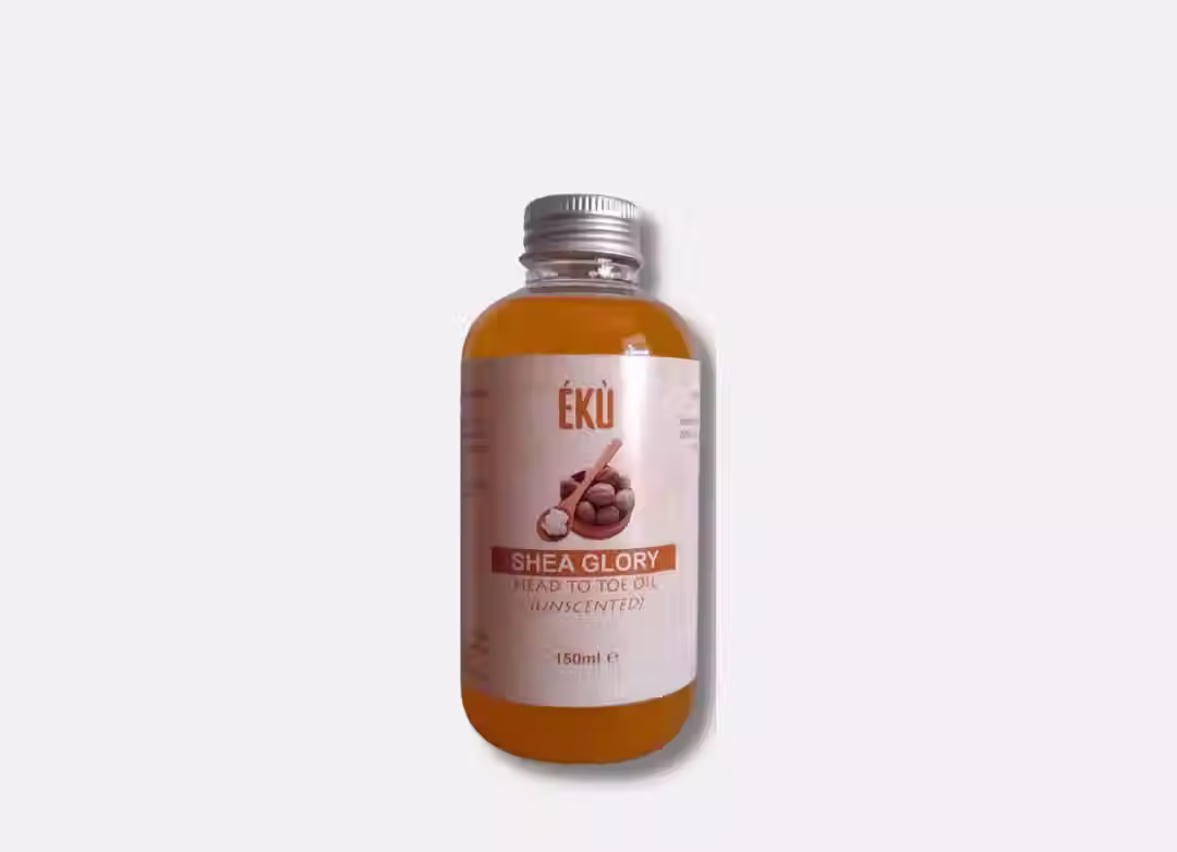 Eku Skincare Absolute Shea Oil bottle with a dropper, highlighting a clear, liquid gold moisturizing formula.