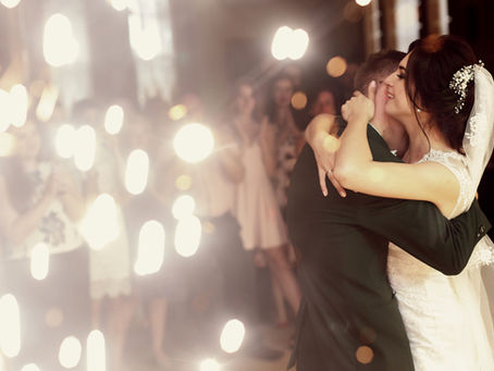 Bride and groom dancing during their wedding reception with professional DJ entertainment in Orlando, Florida.