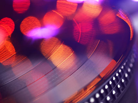 Bride and groom meeting with a professional Wedding DJ to discuss wedding music, reception timeline, and entertainment planning in Orlando, Florida.
