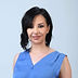 Portrait of Maria Lavithi, CEO of Heroes Made, with a confident expression.