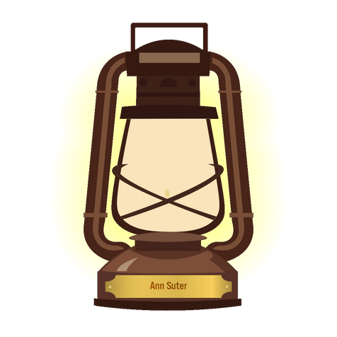 A glowing lantern. Text on a nameplate reads:
"Ann Suter."