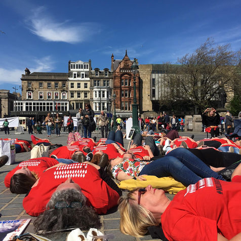 A group of #MillionsMissing demonstrators lying on the ground.