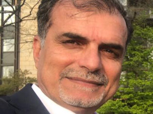 Behind the Closed Doors of the Syrian Revolution: In Conversation with Wassim Hassan