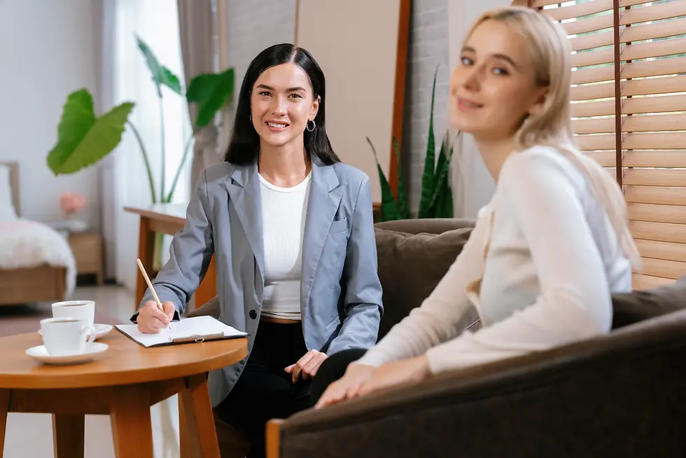 Professional life coach helping a client achieve personal and career goals