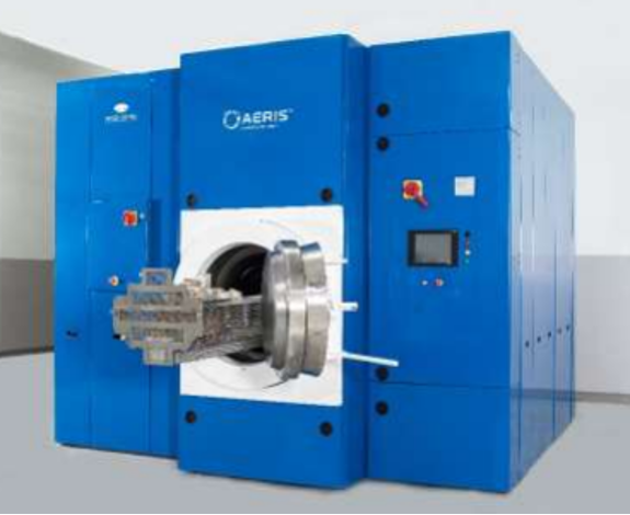 The image shows the Aeris banknote cleaning system. It is a large blew box with a circular opening at one end for the banknotes to be placed into.