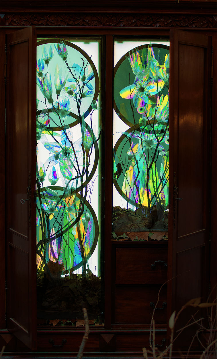 Majestic Insurgence,Light installation, light art, light sculpture, art and science, wardrobe, lion and the witch, birefringence, kinetic art, kinetic sculpture, kinetic light, kinetic installation, lightscape, landscape, botanical art, botanica, STEM, STEAM, science works, installation art, coloured landscape, vista, literature art, hidden world art,  portal, polarisation, polarization,  art in retail, art in shopping centre, Highpoint art, GPT art, mood lighting, art in Melbourne, art in Maribyrnong,  colourful forest, colorful forest, colour, color, health and art, contemplation, vivid colours, vivid colors, magical art, unexpected art, mechatronic art, actuation, light exhibition, fantasy art, children’s art, magical places, imaginarium, delightful art, art and science, science and art, tech art,   colour metamorphosis, color metamorphosis