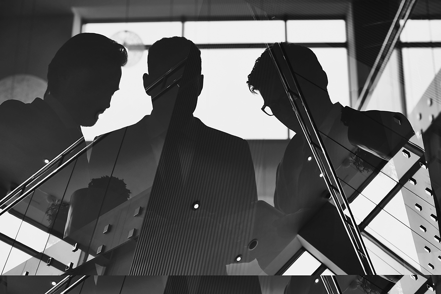 businessmen-reflection_edited.png