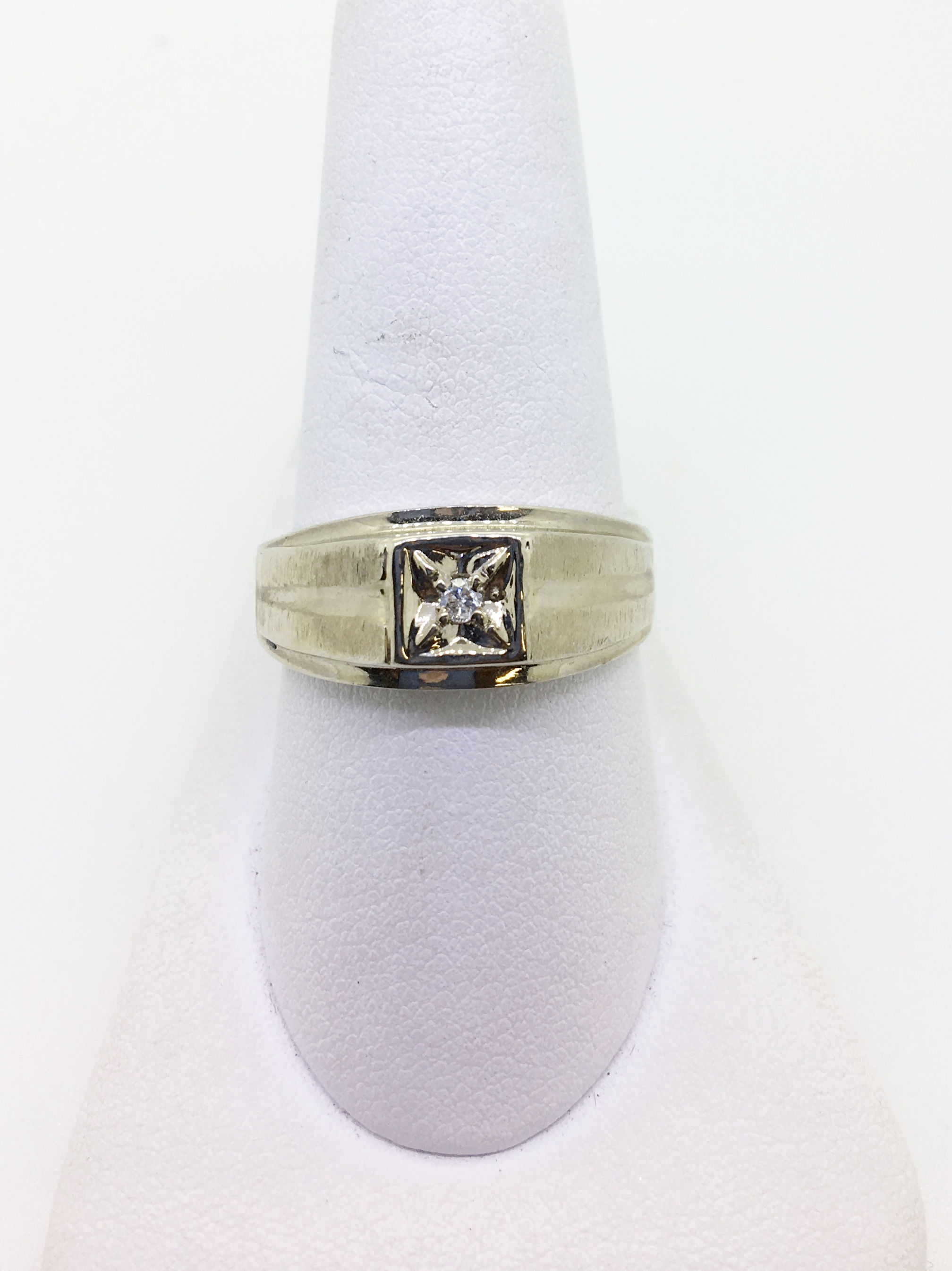 14K yellow gold with center diamond