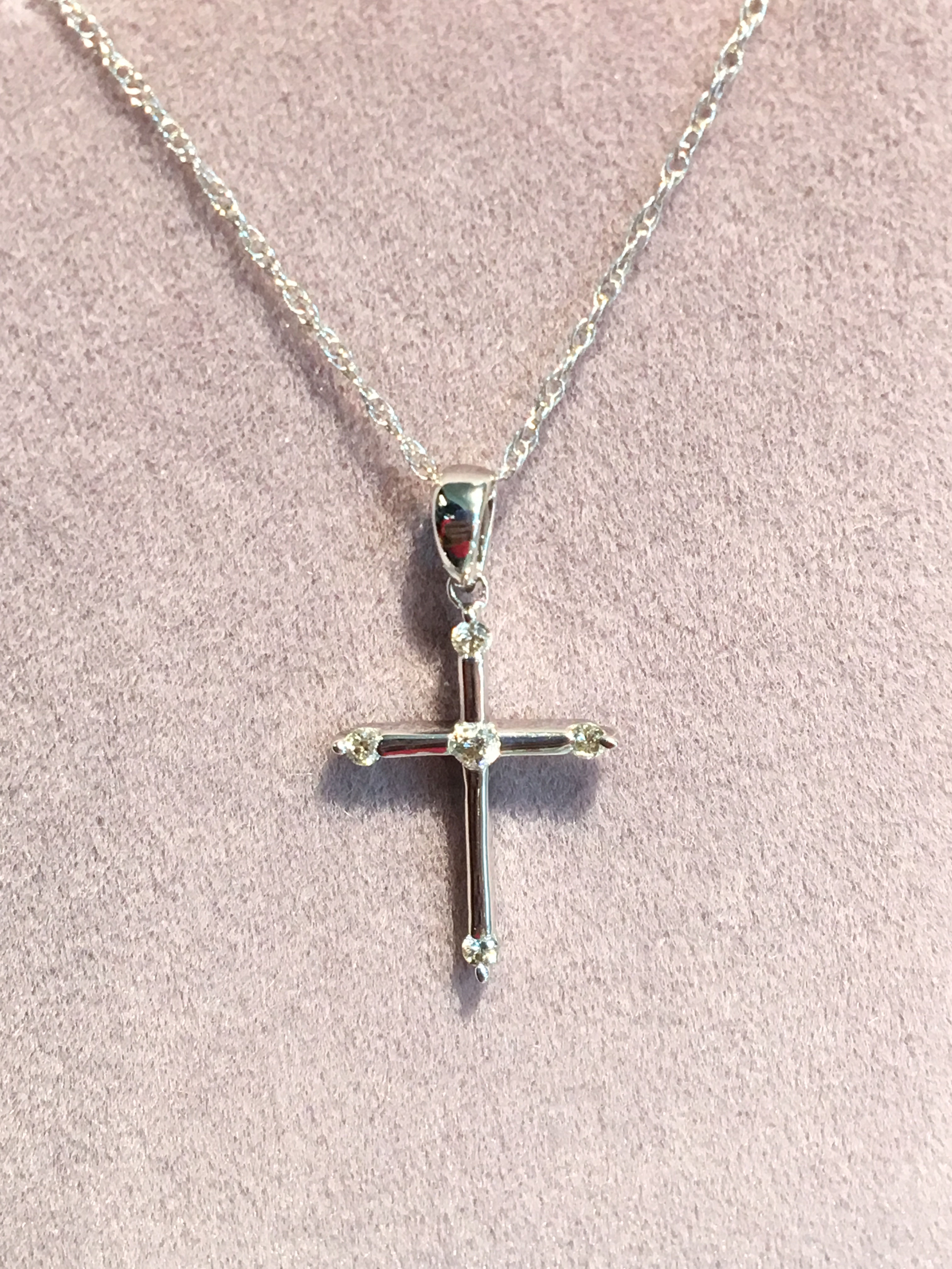 14K White Gold cross .10 points of diamonds