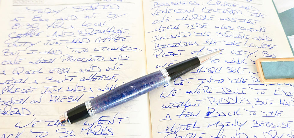 Thumbnail: Black, blue and purple colored pen on open journal pages wiht writing