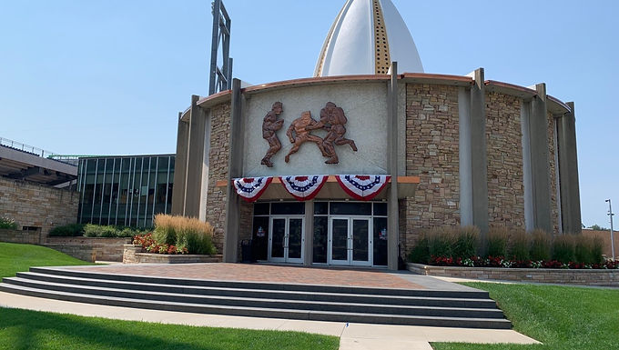 Pro Football Hall of Fame in Canton, Ohio, featuring the museum's distinctive architecture, main entrance, and landscaped grounds