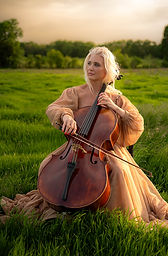 Woman playing cello in a golden field during sunset branding photography session in Bonham, Texas — Sweet Country Photography.