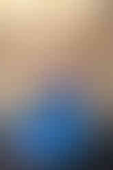 scrubs and gloves forming a heart in front of twu sign