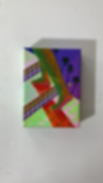 video of surrealist print of a figure walking up tiled stairs. The sky is a dark blue and purple with dark palm trees