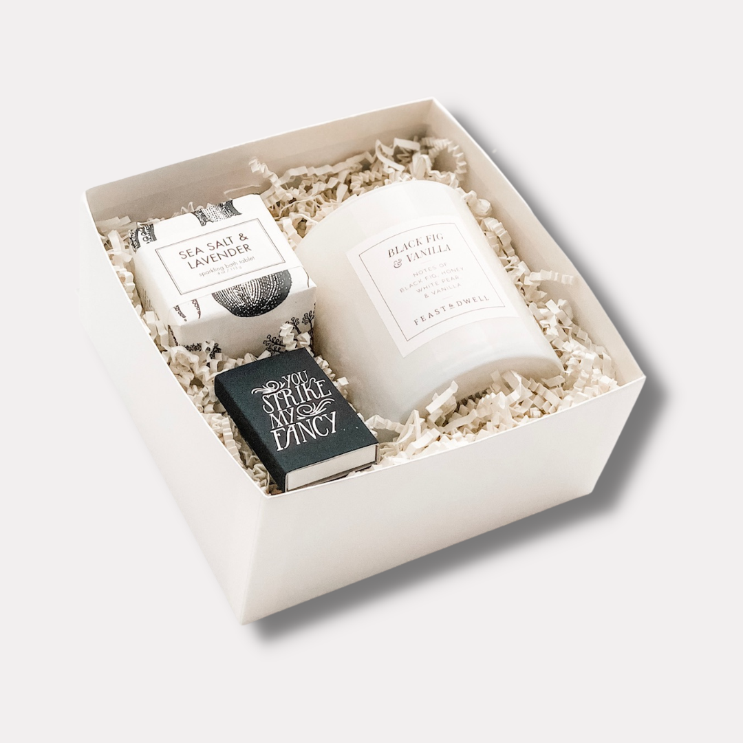 Gift box with candle and matches.webp