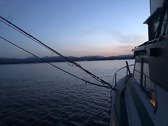 Lisa Jess watching the sun set over Campbell River, BC