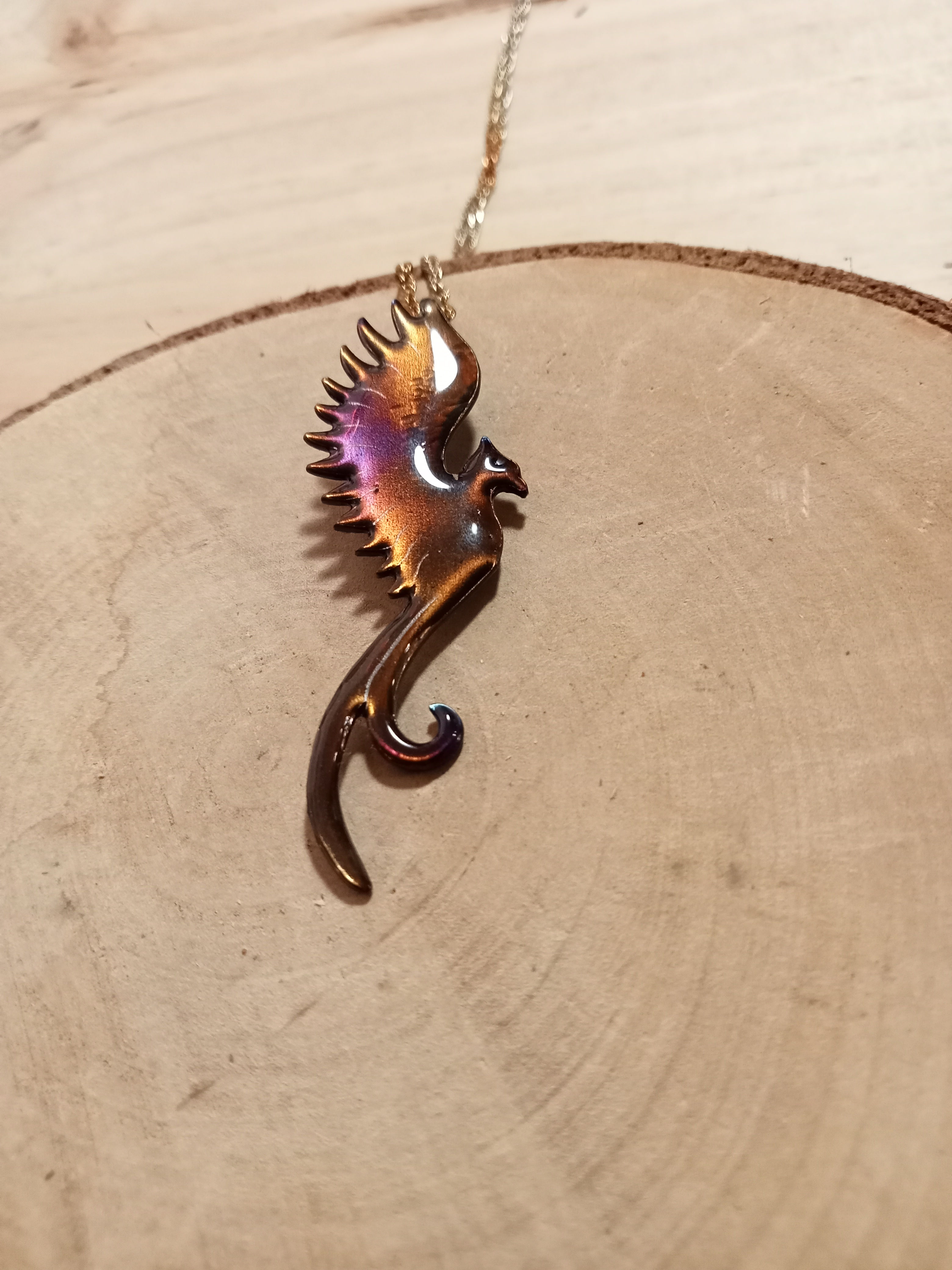 Pendentif phénix de profil