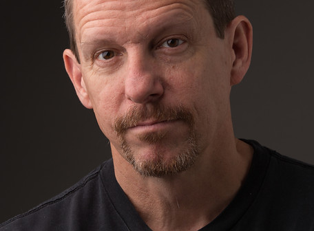 Theis Kevin - Headshot.jpeg