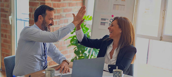 planassist two person smiling and high five