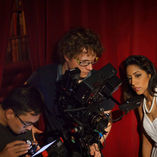 The crew is checking the frame and focus on set of a short film.