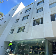 Abseiler Painting Building Facade