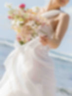 Bridal bouquet in the wind at 1 Hotel Hanalei Bay, photographed in Kauai