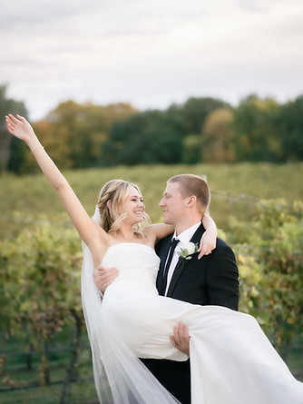 Romantic moment between newlyweds overlooking a Napa hillside
