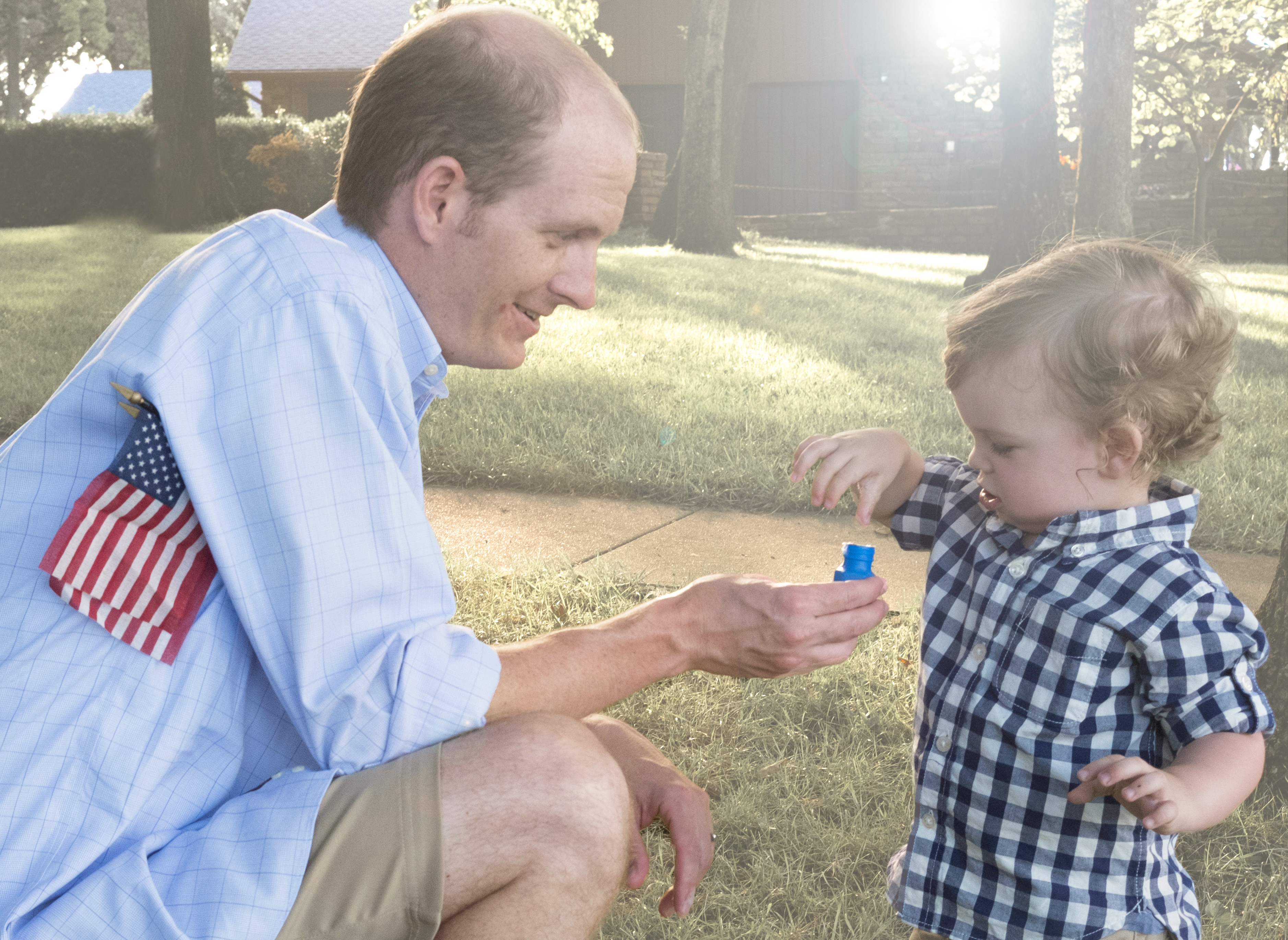 Father and son with bubbles