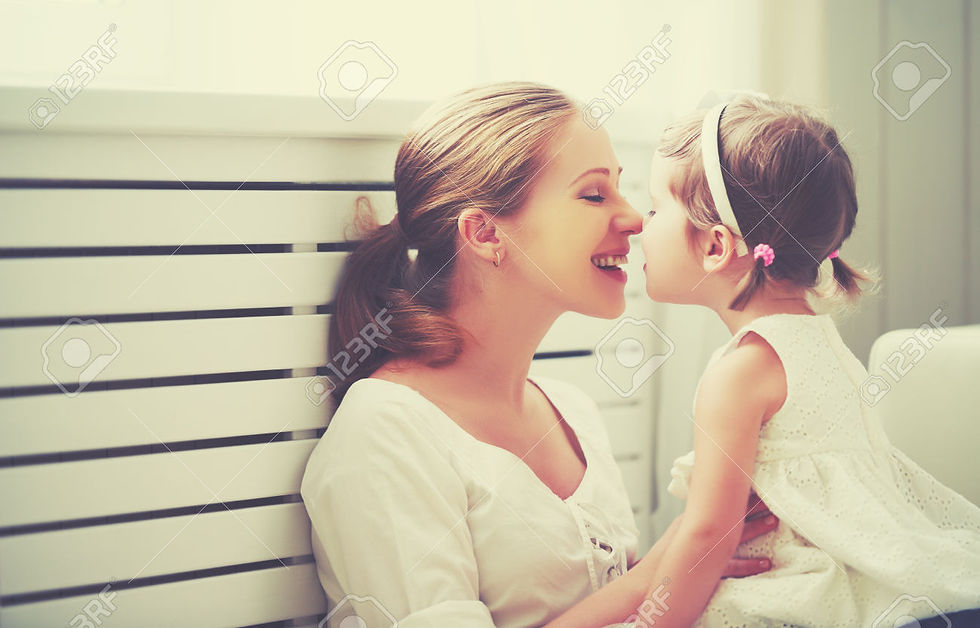 Stock Photo - Happy loving family. mother and child girl playing, kissing and hugging