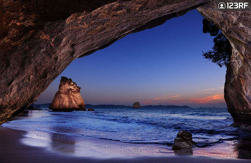 123RF World Travel Guide: Nauru to Nigeria 123RF Blog - Cathedral Cover at sunrise in New Zealand