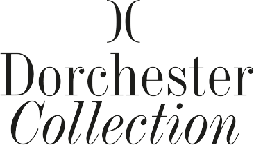 Dorchester Collection logo with a stylized X above the Dorchester Collection text.