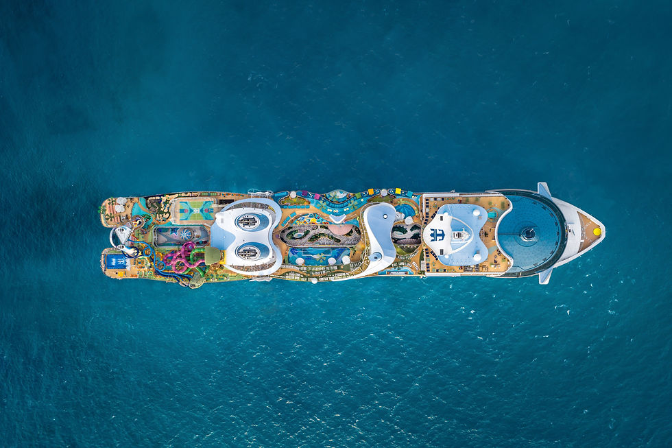 Aerial view of a luxury cruise ship sailing on the blue ocean