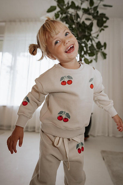 Girl in Cherry Bottom Sweatpants