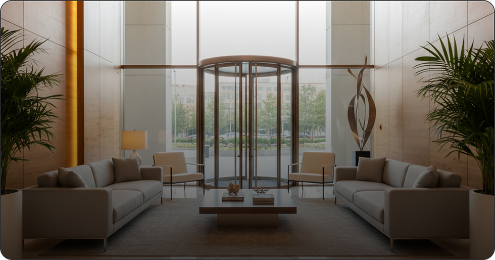 Modern building lobby with revolving door and lounge area