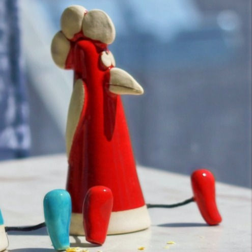 Miniature : Poule Assise
