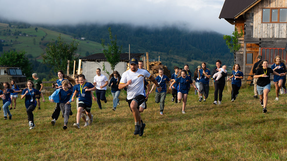 Students do PT during a Junior Ranger program in Ukraine.