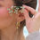 Thumbnail: Golden Shell Earrings