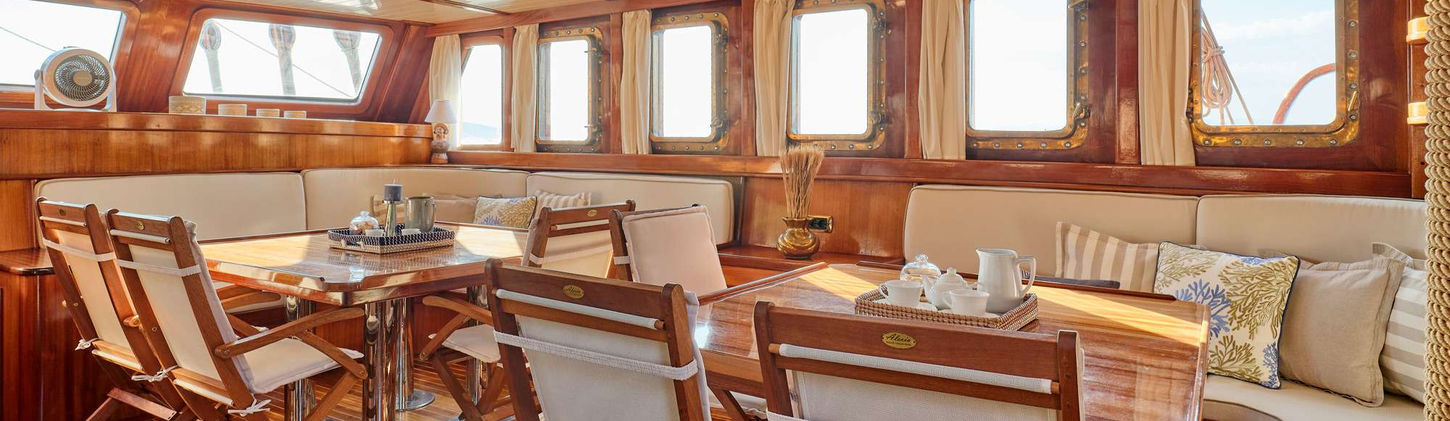 Myra gulet salon lounge and dining tables for 12 guests