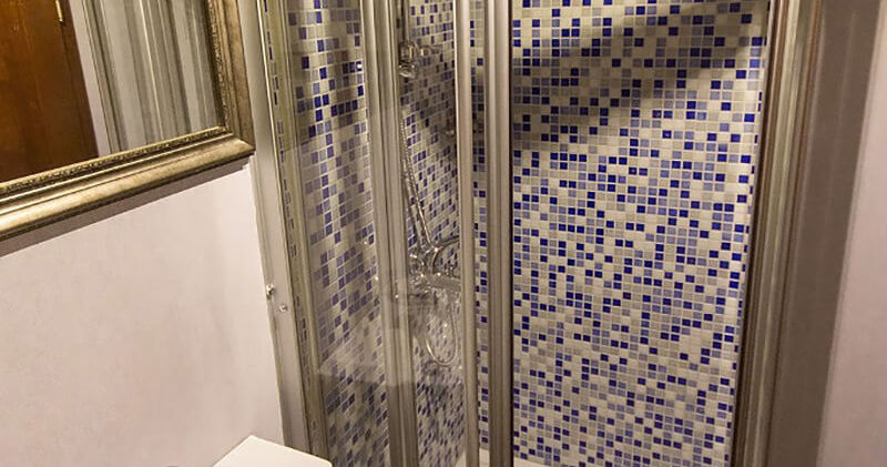 Cekin gulet cabin bathroom modern shower unit and WC with porthole light