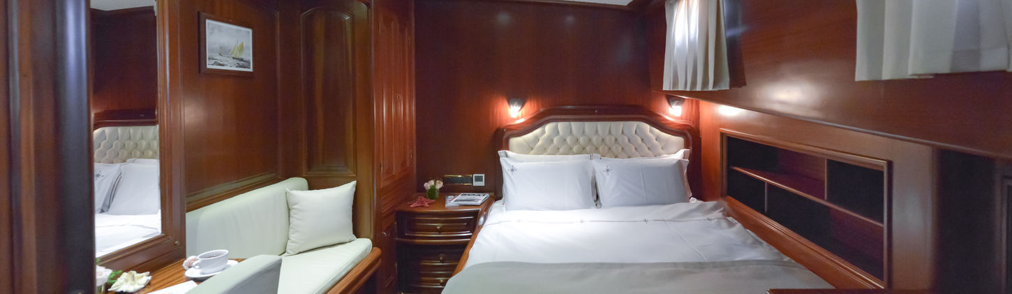 Lady Christa gulet double guest cabin interior with en-suite shower and wardrobe