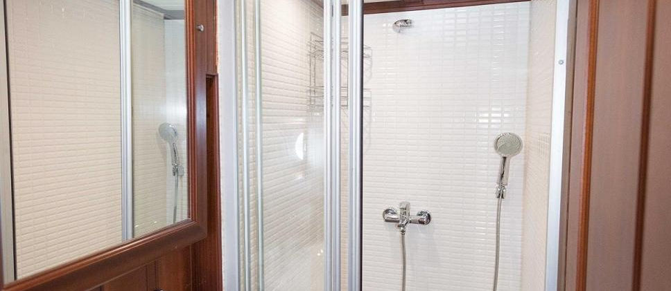 Primadonna gulet cabin bathroom modern shower cabin toilet and porthole light