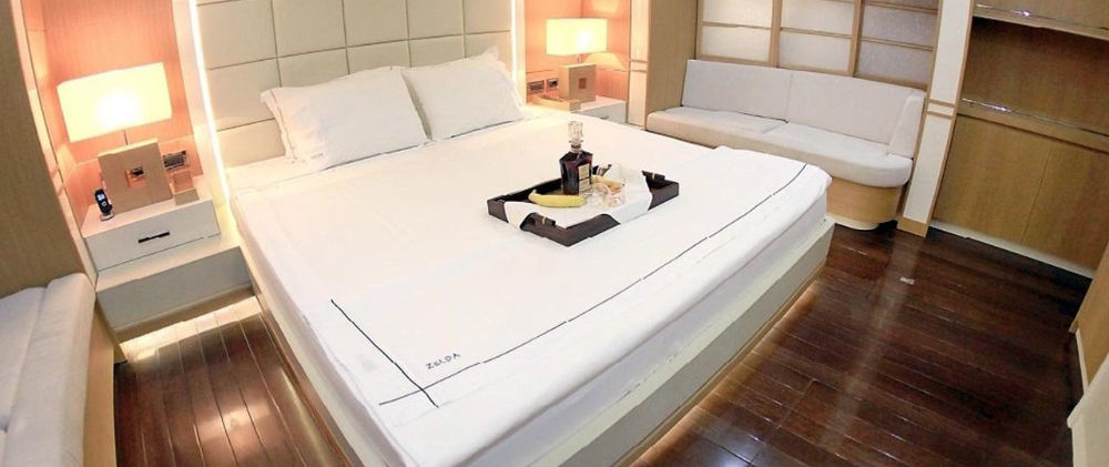 Zelda gulet master cabin interior with king-size bed and en-suite