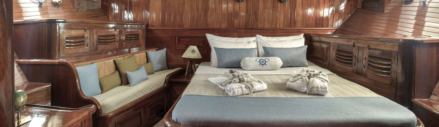 Virtuoso gulet double guest cabin interior with wardrobe and en-suite