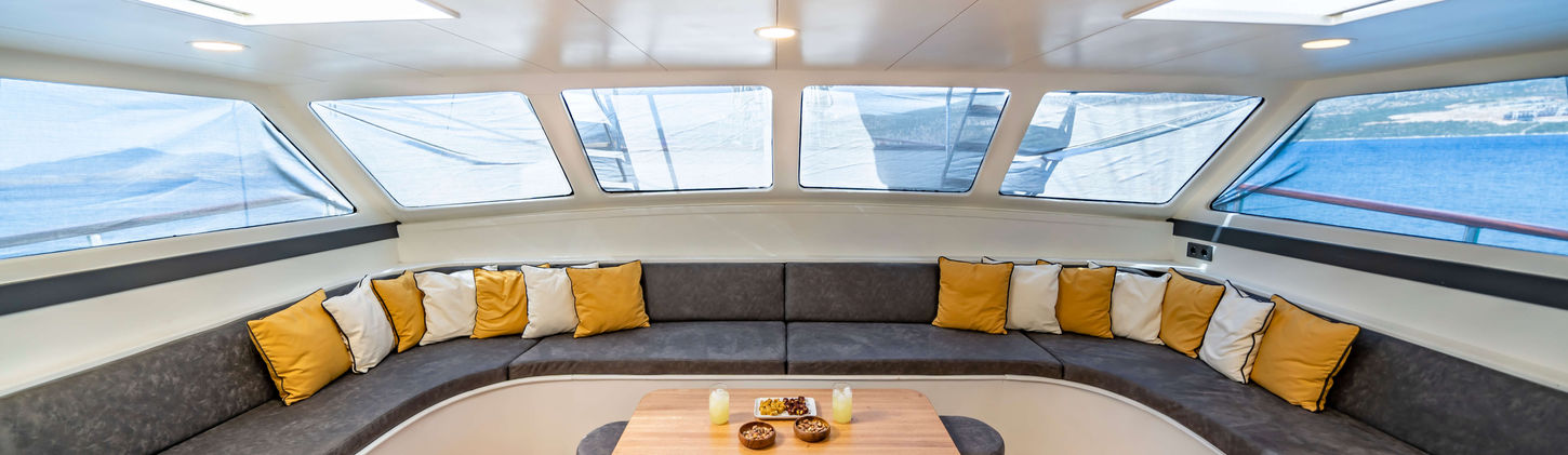 Golden Glory gulet interior salon lounge bar, TV and seating