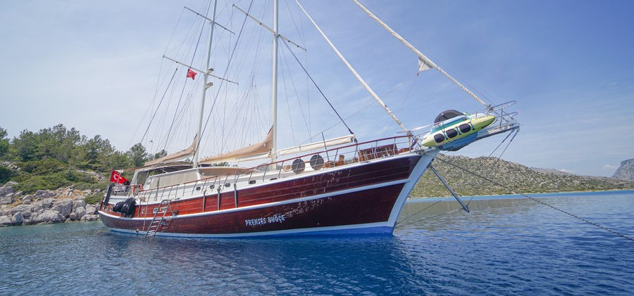Prenses Bugce gulet exterior side view sailing along Turkish Riviera