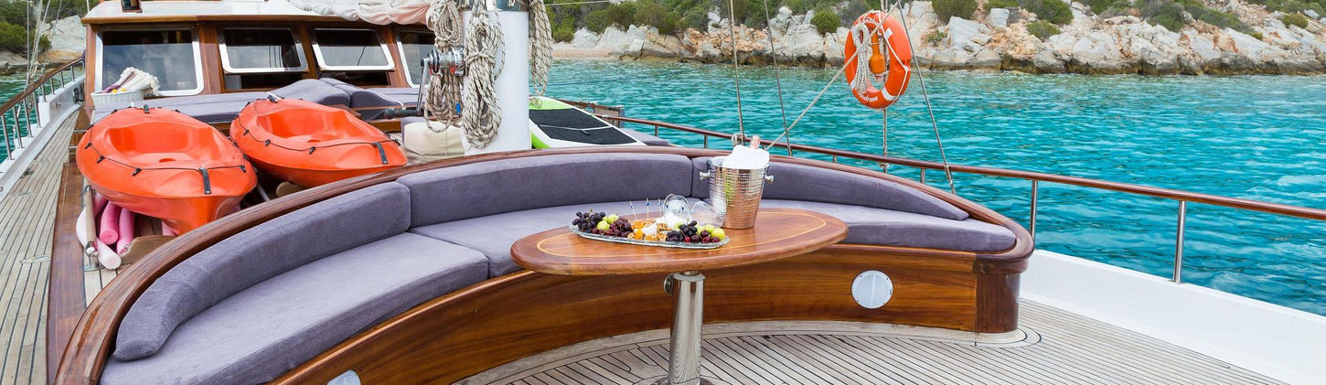 Primadonna gulet foredeck sun-lounger area with panoramic sea view